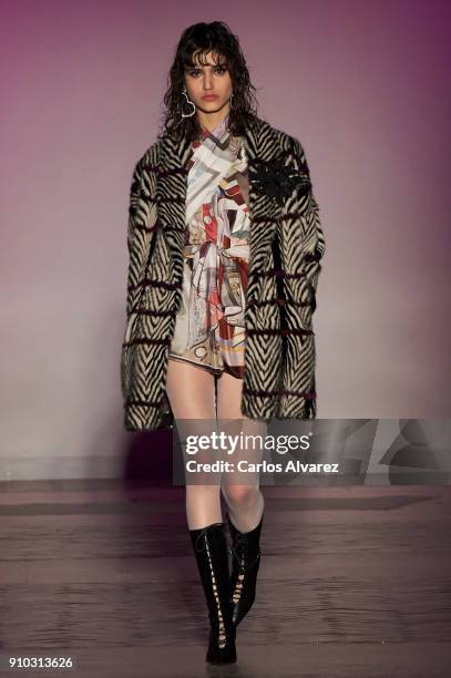 Model walks the runway at the Juan Vidal fashion show during the Mercedes Benz Fashion Week Autumn/Winter 2018 at the Casa de Correos on January 25,...