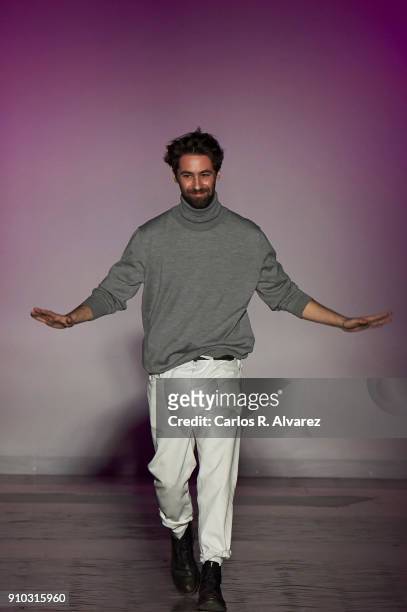 Spanish designer Juan Vidal walks the runway at the end of the Juan Vidal fashion show during the Mercedes Benz Fashion Week Autumn/Winter 2018 at...