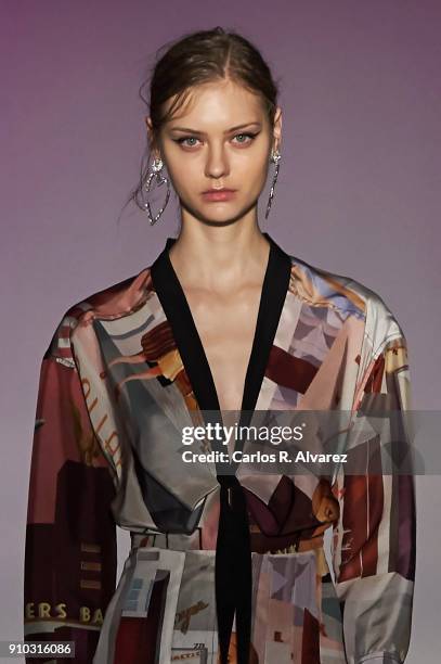 Model walks the runway at the Juan Vidal fashion show during the Mercedes Benz Fashion Week Autumn/Winter 2018 at the Casa de Correos on January 25,...