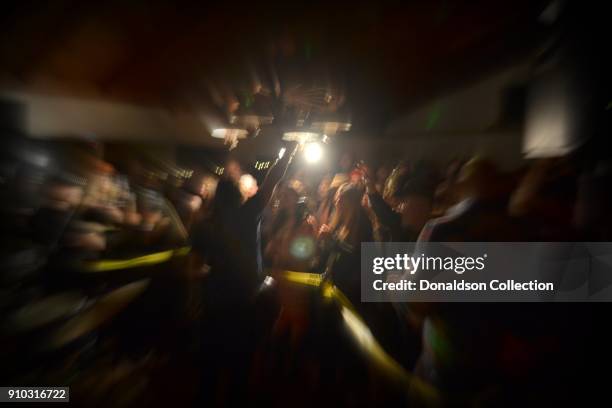 Lukas Nelson of the rock and roll band "Lukas Nelson and the Promise of the Real" performs onstage at a houseparty on November 29, 2013 in Topanga,...