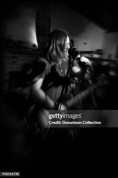 Lukas Nelson of the rock and roll band "Lukas Nelson and the Promise of the Real" performs onstage at a houseparty on November 29, 2013 in Topanga,...