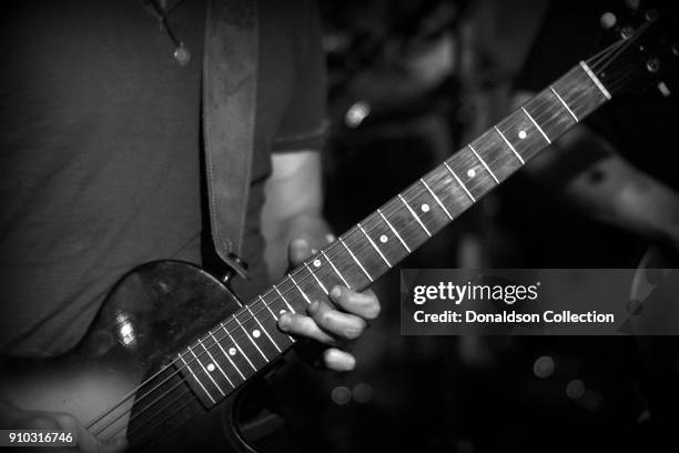 Lukas Nelson of the rock and roll band "Lukas Nelson and the Promise of the Real" performs onstage at a houseparty on November 29, 2013 in Topanga,...