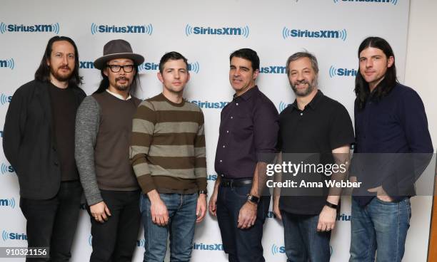 Michael Bonfiglio, Joe Kwon, Scott Avett, Rob Crawford, Judd Apatow and Seth Avett pose at SiriusXM Studios on January 25, 2018 in New York City.