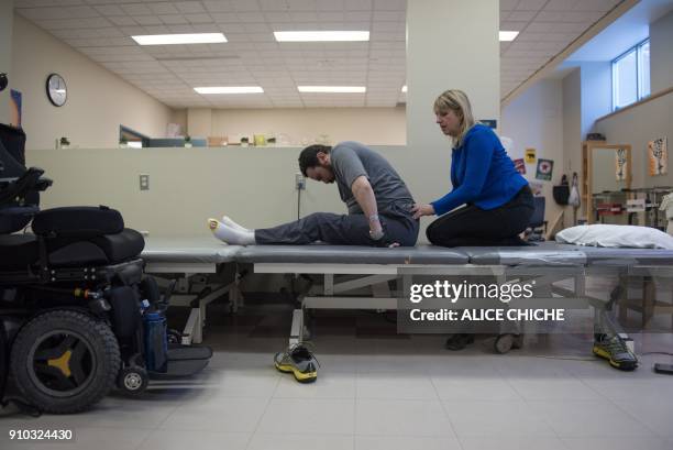 Aymen Derbali a victim of the Quebec City mosque attack, undergoes rehabilitation exercises on January 25, 2018 in Quebec City, Canada. Derbali has...