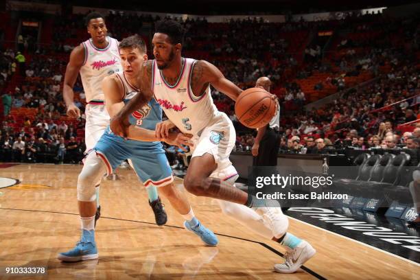 Derrick Jones Jr. #5 of the Miami Heat handles the ball against the Sacramento Kings on January 25, 2018 at AmericanAirlines Arena in Miami, Florida....