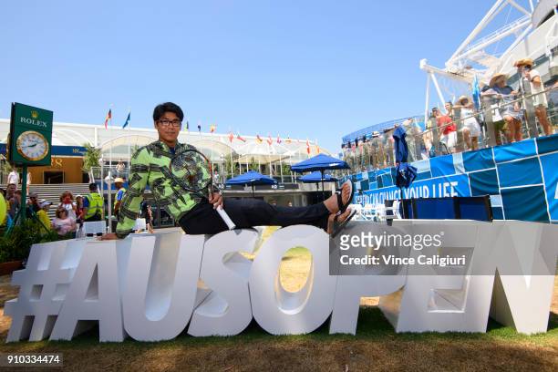 Hyeon Chung of South Korea poses on the AusOpen hashtag on day 11 of the 2018 Australian Open at Melbourne Park on January 23, 2018 in Melbourne,...