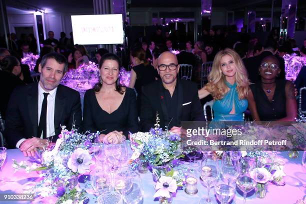 Jalil Lespert, French Health Minister Agnes Buzyn, Pascal Obispo, his wife Julie Obispo and Emmy Liyana attend the 16th Sidaction as part of Paris...
