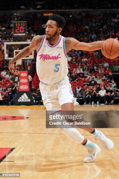 Derrick Jones Jr. #5 of the Miami Heat handles the ball against the Sacramento Kings on January 25, 2018 at American Airlines Arena in Miami,...