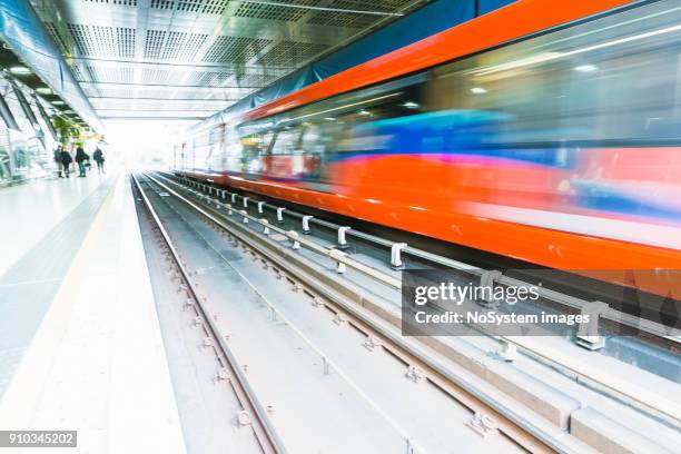 platform of the london underground with train approaching - light at the end of the tunnel stock pictures, royalty-free photos & images