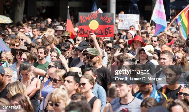 Protestors gather outside State Parliament with aboriginal flags on January 26, 2018 in Melbourne, Australia. Australia Day, formerly known as...