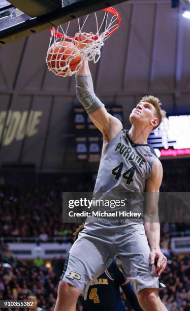 Isaac Haas of the Purdue Boilermakers dunks the ball against the Michigan Wolverines at Mackey Arena on January 25, 2018 in West Lafayette, Indiana.