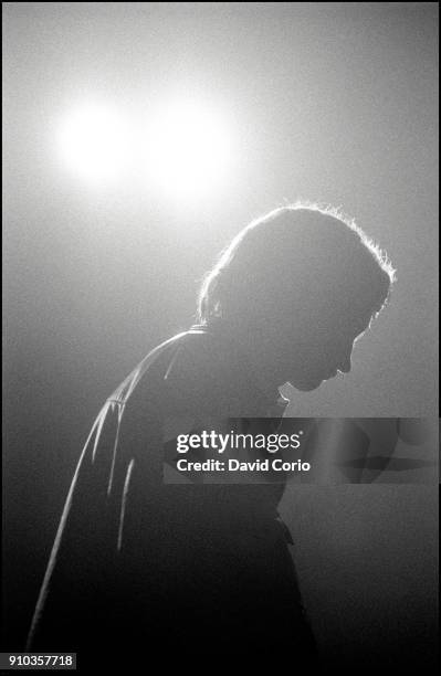 Mark E Smith of The Fall performing at The Lyceum Theatre, London, UK on 12 December 1982.