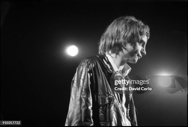 Mark E Smith of The Fall performing at The Lyceum Theatre, London, UK on 12 December 1982.