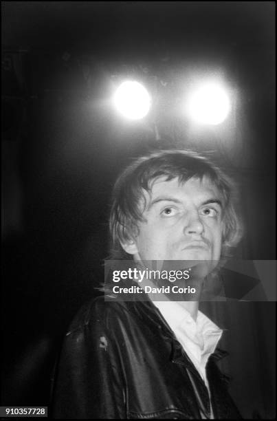 Mark E Smith of The Fall performing at The Lyceum Theatre, London, UK on 12 December 1982.