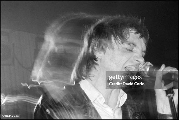 Mark E Smith of The Fall performing at The Lyceum Theatre, London, UK on 12 December 1982.