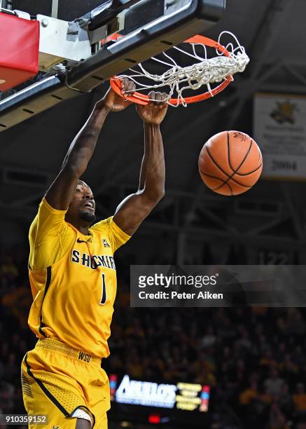Zach Brown of the Wichita State Shockers scores with a dunk against the UCF Knights during the first half on January 25, 2018 at Charles Koch Arena...