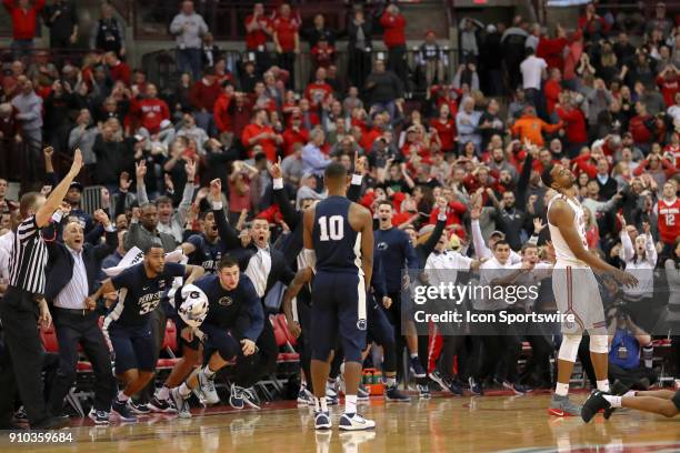 Penn State Nittany Lions guard Tony Carr stands still after making a three point shot at the buzzer to win in a game between the Ohio State Buckeyes...