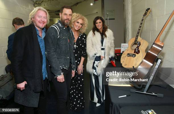 Singers Phillip Sweet, Jimi Westbrook, Kimberly Schlapman, and Kimberly Schlapman of musical group Little Big Town with the GRAMMY Charities Signings...