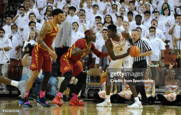 Texas Longhorns center Mohamed Bamba is defended by Iowa State Cyclone players Nick Weiler-Babb and Solomon Young during the Texas Longhorns 73-57...