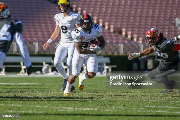 National fullback Daniel Marx from Stanford runs the ball for a gain during the NFLPA Collegiate Bowl on Saturday, January 20 at the Rose Bowl in...