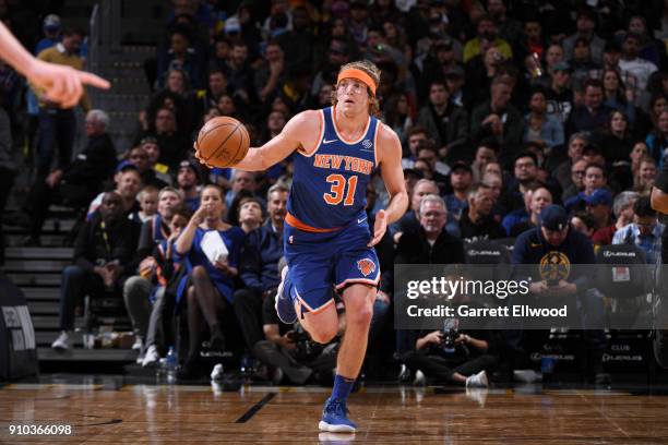 Ron Baker of the New York Knicks handles the ball against the Denver Nuggets on January 25, 2018 at the Pepsi Center in Denver, Colorado. NOTE TO...