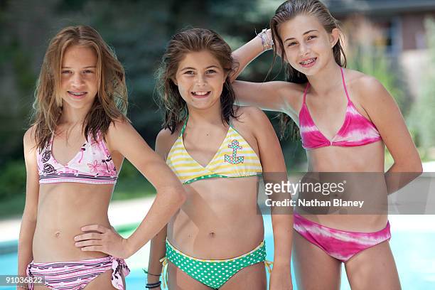 three portrait girls - preteen girl swimsuit stock pictures, royalty-free photos & images