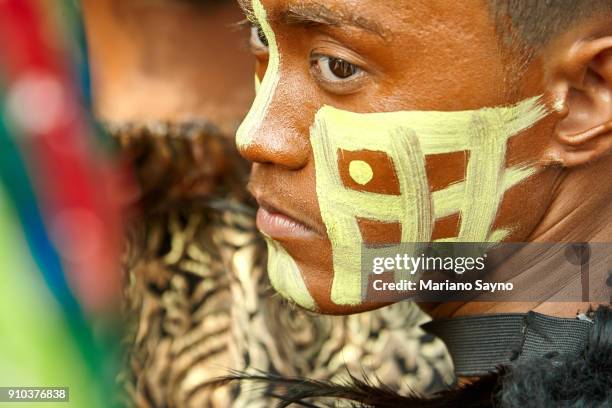 tribesman at festival - dinagyang festival stock pictures, royalty-free photos & images