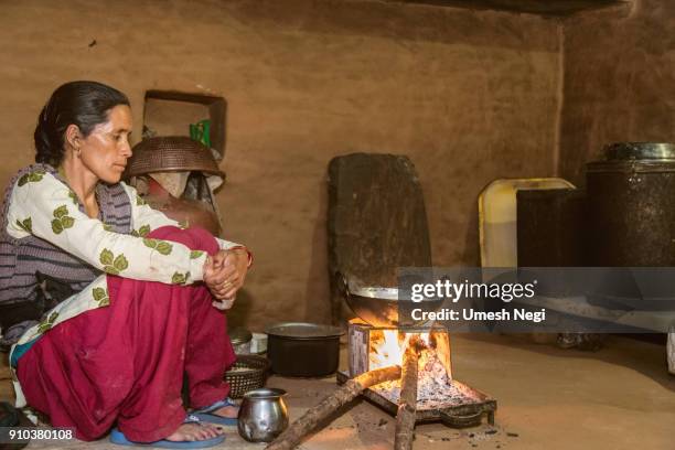 indian village woman preparing food - rural india stock pictures, royalty-free photos & images