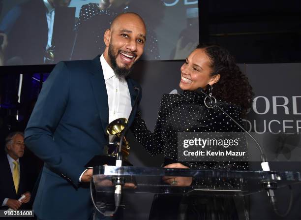 Swizz Beatz and Alicia Keys speak onstage during the Producers and Engineers Wing 11th Annual GRAMMY Week event honoring Swizz Beatz and Alicia Keys...