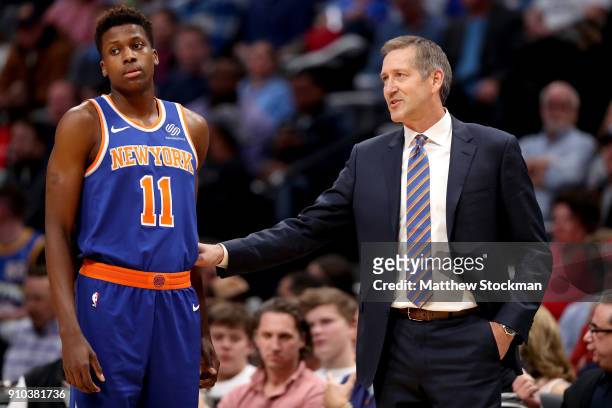 Head coach Jeff Hornacek of the New York Knicks reassures Frank Ntilinkina after his foul against the Denver Nuggets at the Pepsi Center on January...