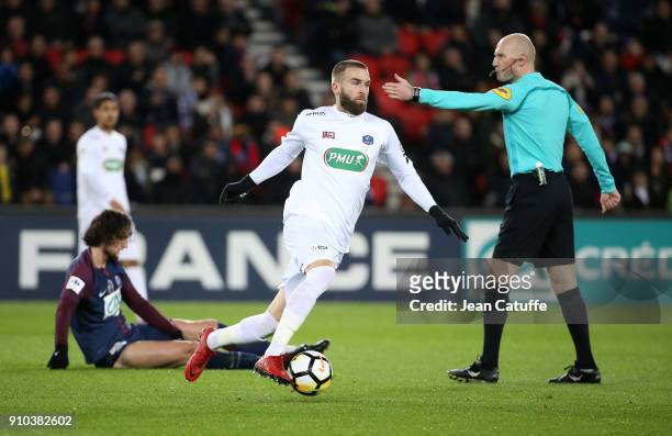 Lucas Deaux of Guingamp, Adrien Rabiot of PSG and referee Antony Gautier during the French National Cup match between Paris Saint Germain and En...