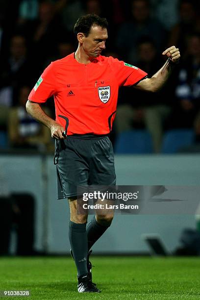 Referee Florian Meyer gestures during the DFB Cup second round match between VfL Bochum and FC Schalke 04 at Rewirpower Stadium on September 22, 2009...