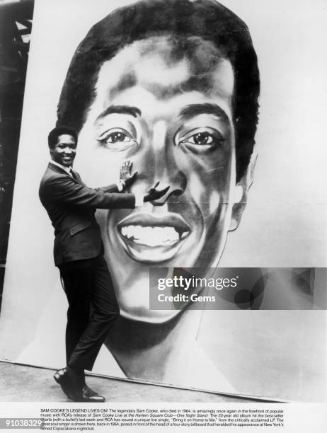 American soul singer and songwriter Sam Cooke poses in front of a billboard advertising his appearance at the Copacabana nightclub in New York, June...