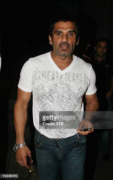 Indian Bollywood actor Suniel Shetty attends a party in honour of the crew of Kanchivaram in Mumbai on September 23, 2009. The film Kanchivaram won...