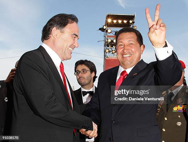 Director Oliver Stone and president Hugo Chavez attend the "South Of The Border" Premiere at the Sala Grande during the 66th Venice Film Festival on...