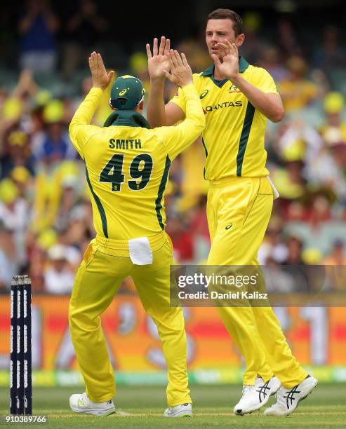 Steve Smith of Australia celebrates with Josh Hazlewood of Australia during game four of the One Day International series between Australia and...