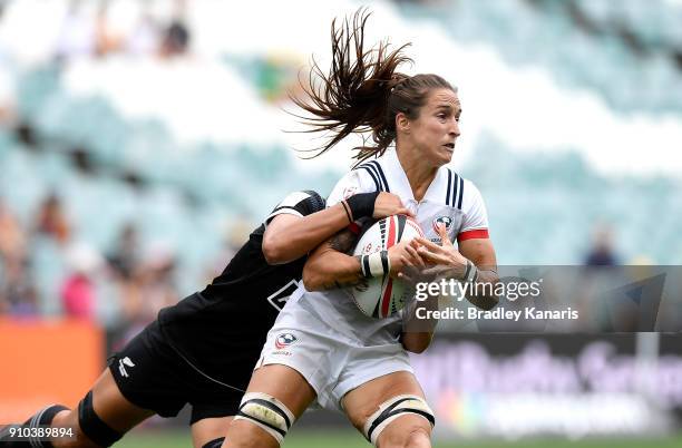 Ryan Carlyle of the USA is tackled in the match against New Zealand during day one of the 2018 Sydney Sevens at Allianz Stadium on January 26, 2018...