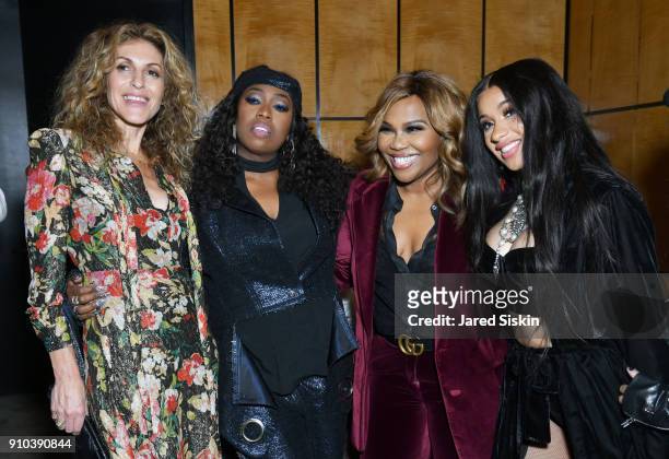 Chairman & COO Atlantic Records Group Julie Greenwald, Missy Elliott, a guest, and Cardi B attend the Warner Music Group Pre-Grammy Party in...