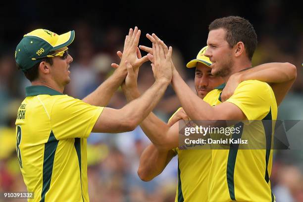 Josh Hazlewood of Australia celebrates with his team mates during game four of the One Day International series between Australia and England at...