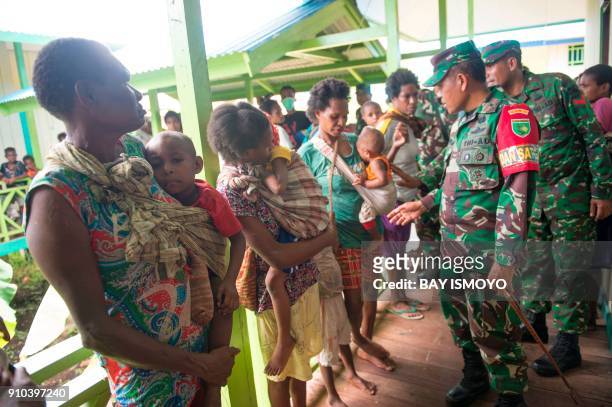 Commander of the Indonesian millitary medical task force Asep Setia Gunawan visit a local clinic at Ayam village in Asmat district, in West Papua...