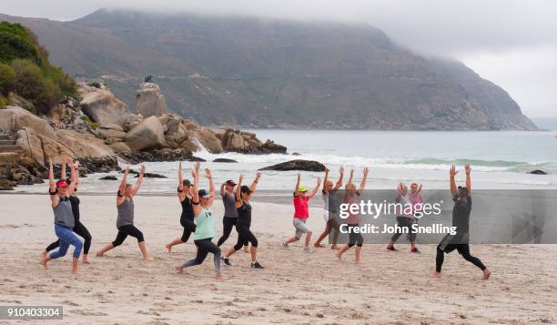 keep fit on hout bay beach - hout stock pictures, royalty-free photos & images