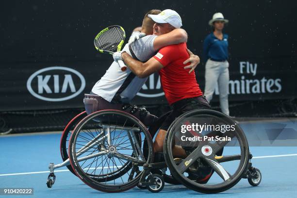 Nicolas Peifer of France and Stephane Houdet of France celebrate after winning the men's wheelchair doubles final against Alfie Hewitt of Great...