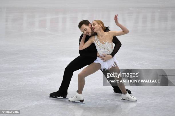 Tarah Kayne and Danny O'Shea of the US perform during the pairs free skating program at the ISU Four Continents figure skating championships in...