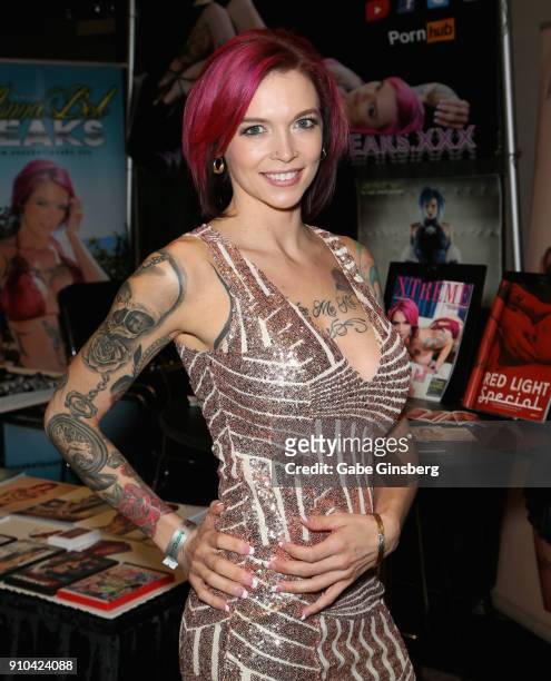 Adult film actress Anna Bell Peaks poses in her booth during the 2018 AVN Adult Expo at the Hard Rock Hotel & Casino on January 25, 2018 in Las...