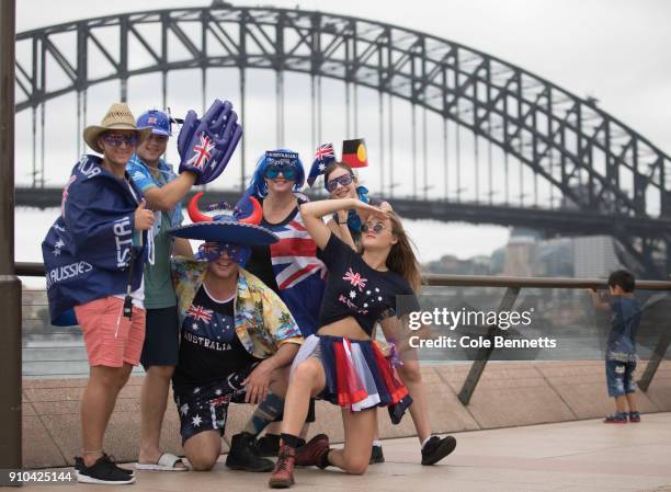 Australia Day revelers pose for photos at Circular Quay on January 26, 2018 in Sydney, Australia. Australia Day, formerly known as Foundation Day, is...