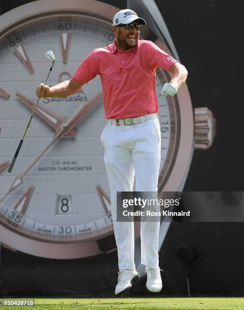 Matthew Southgate of England celebrates a hole in one on the 7th hole during round two of the Omega Dubai Desert Classic at Emirates Golf Club on...