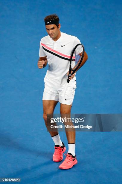 Roger Federer of Switzerland celebrates winning a point in his semi-final match against Hyeon Chung of South Korea on day 12 of the 2018 Australian...