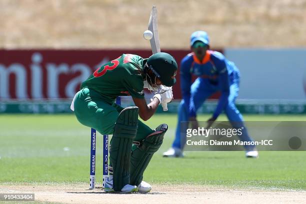 Mohammad Naim Sheikh of Bangladesh avoikds a bouncer during the ICC U19 Cricket World Cup match between India and Bangladesh at John Davies Oval on...