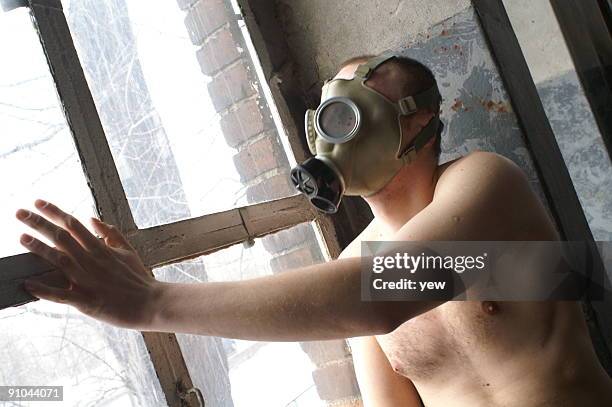 man in the gas mask - killing germs stock pictures, royalty-free photos & images