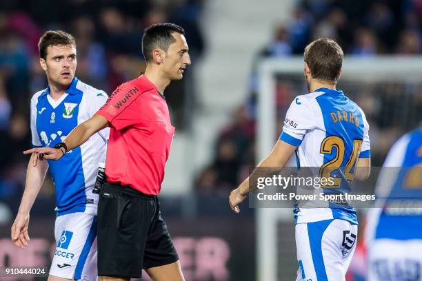 Referee Jose Maria Sanchez Martinez speaks to Darko Brasanac of CD Leganes during the Copa del Rey 2017-18 match between CD Leganes and Real Madrid...